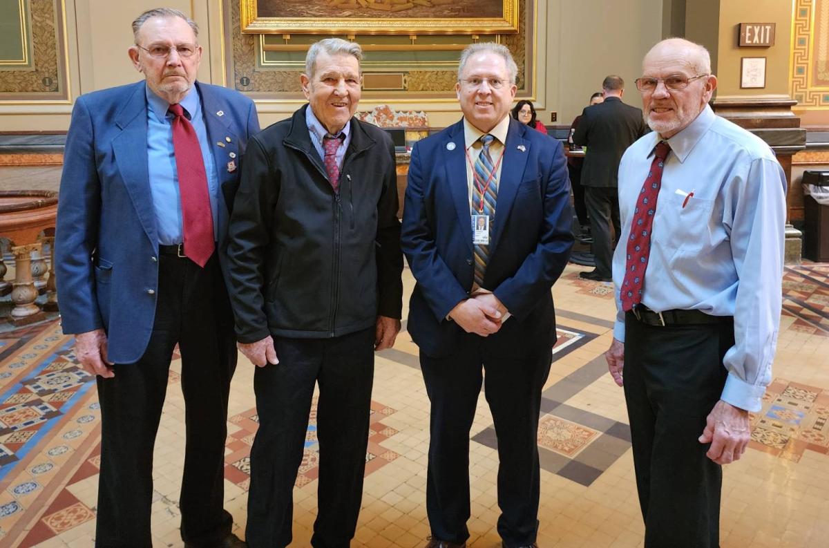 Farm Bureau members Al Schafbuch, Robert Ritscher, and Lynn Rinderknecht visit the Capitol Feb. 21 to discuss farm policies.