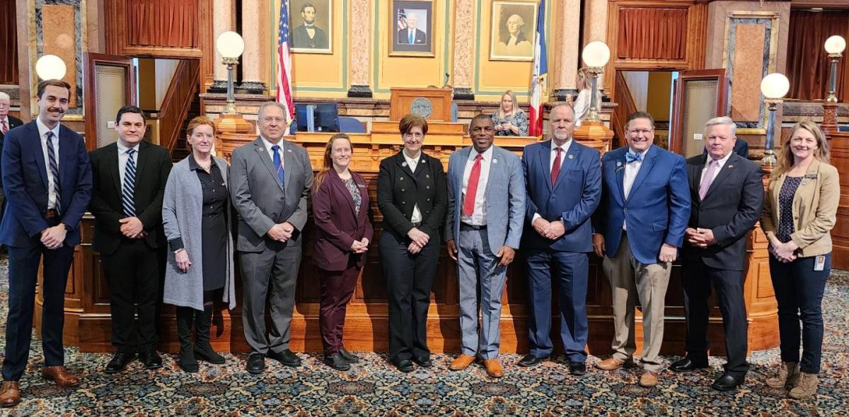 Canadian Consul General Beth Richardson (center, directly in front of podium) meets with Iowa legislators on Jan. 10th.