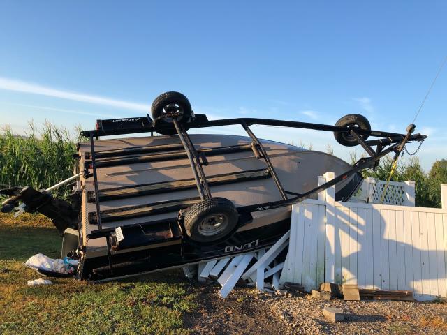 This boat at the Jim and Wendy Frentress residence was found overturned in their yard.