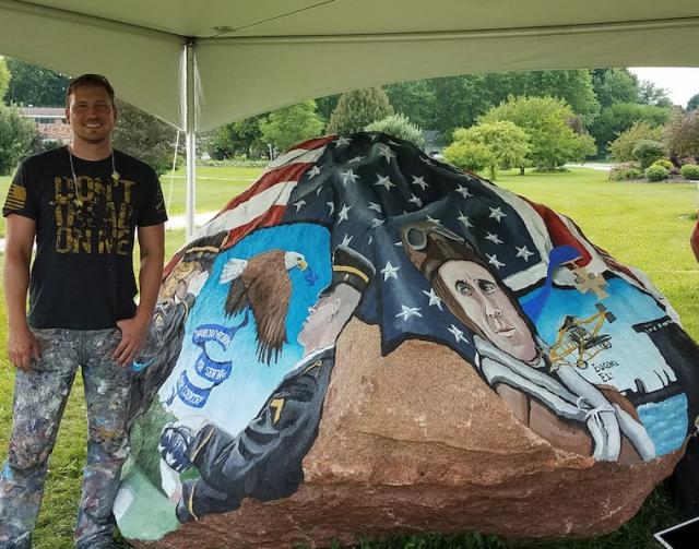 To the left of the rock is Ray “Bubba” Sorensen, the Freedom Rock artist.