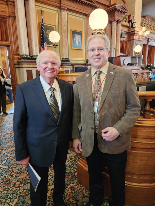 Former Benton County Senator John Putney, Gladbrook, visits the Capitol for Pioneer Lawmakers Day.