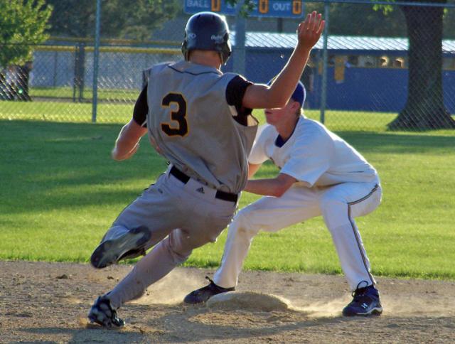 Viking speedster Travis Libbert has many stolen bases; but he was out in this steal attempt.