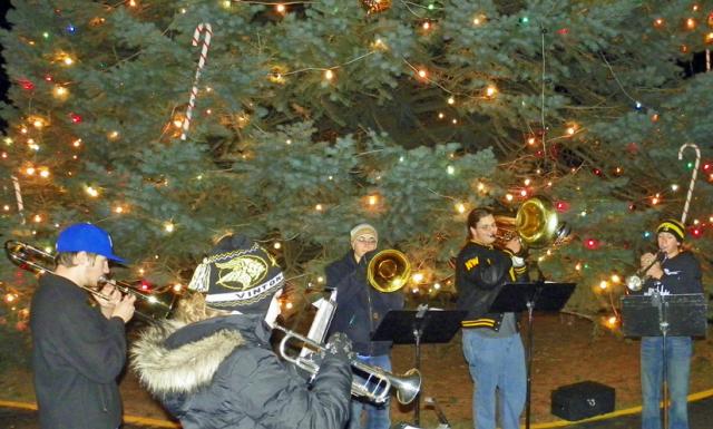VSHS band members play Christmas songs after VGH tree was lit Thursday.