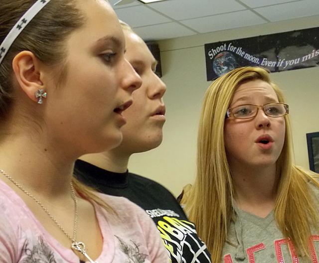 Charlyn Fowler, Erin Wood and Taylor Dearborn practice