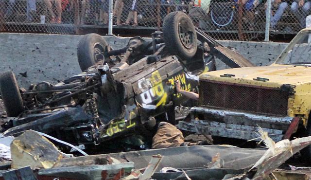 The driver of this vehicle walked away unhurt after it landed on its top during the trailer race.
