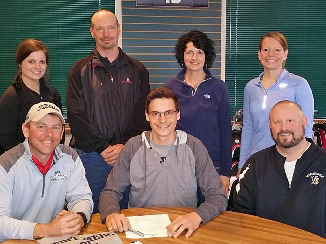 Tyler Stueck, with MMU coach Luke Slaymaker & VS coach Chad Pettyjohn, signs his Letter of Intent.