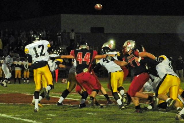Lincoln Riffey fires a pass for the Vikings in loss at Union Friday.