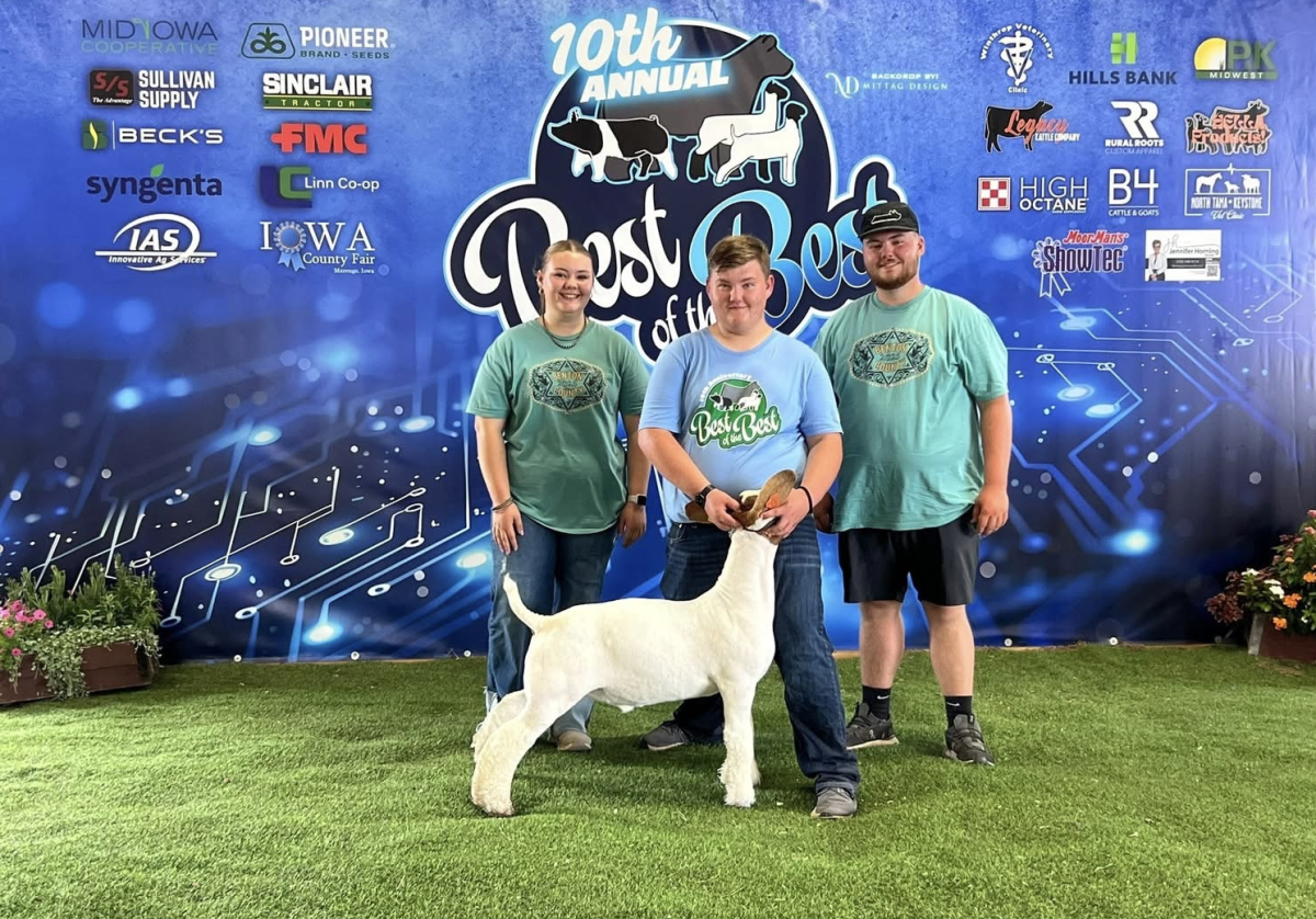 Will McKenna with his meat goat and his siblings, Abby and Clayton