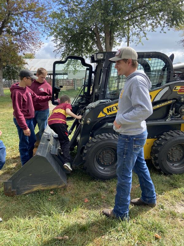 Kids were able to go inside the skid loader while learning about “blind spots” and why they are bad.