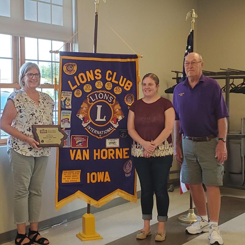 Cindy Reinberg and Hannah Choplick, Van Horne Family Medical Clinic and Larry Albers, Van Horne Lion