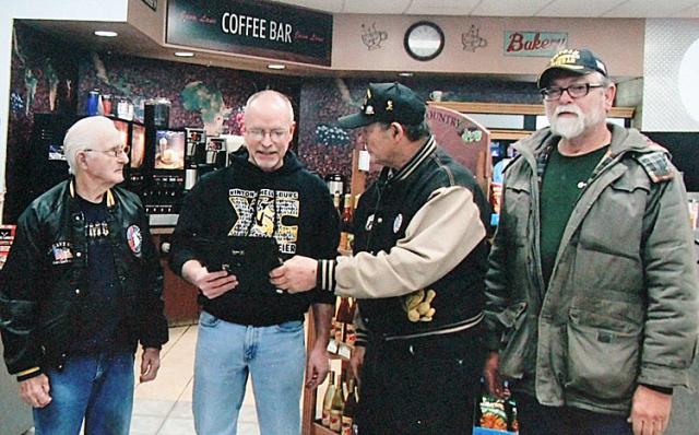 VFW members thank Terry Ehlinger for his support of Poppy Days.
