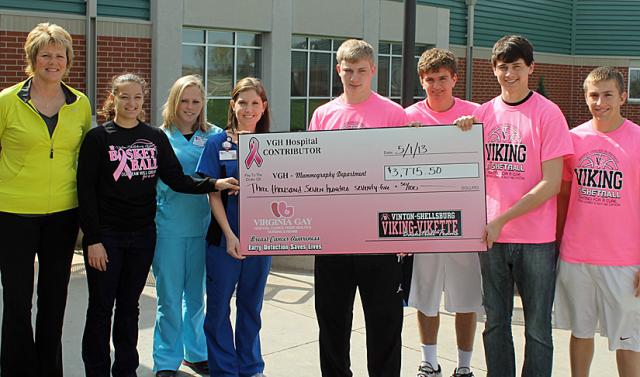 VS basketball players and Coach Deb Schirm presented a check for $3,775 to VGH Imaging Services.