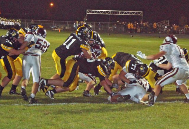 Viking blockers pave the way for a Kelyn Rickels touchdown.
