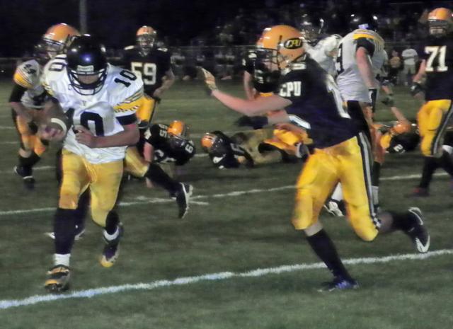 Logan Williams crosses the goal line to give Vikings a 20-10 lead at CPU.