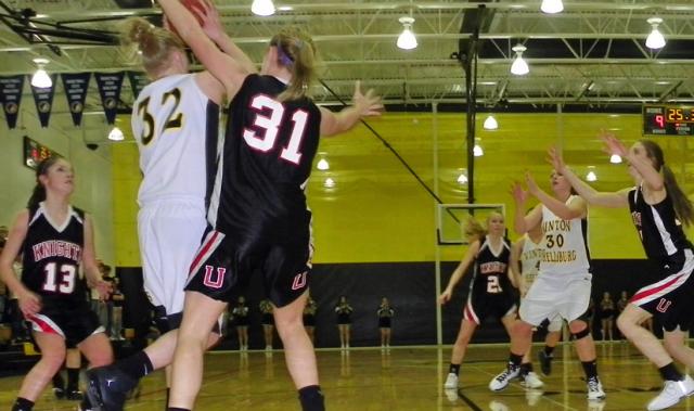 Allison Emrich and Makenzie Westendorf work to move the ball inside.