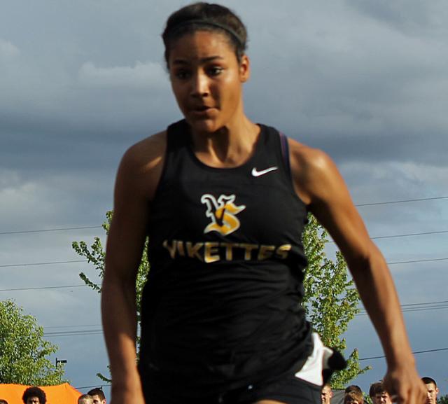 Cheyenne Barnes runs the 100 M dash during the WaMaC meet in Vinton.