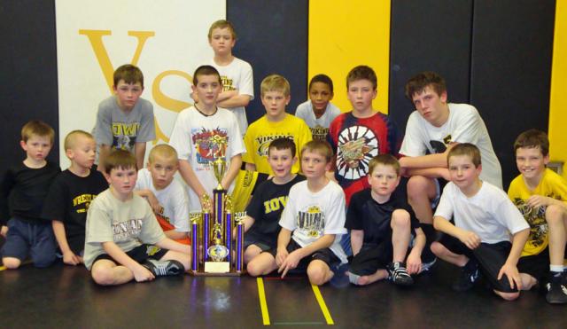 Viking Wrestling Club members pose with their 2nd place trophy at Alburnett, Friday.