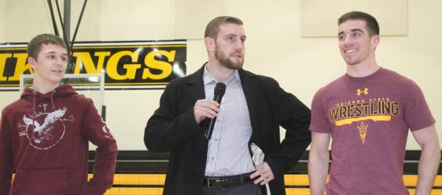Luke Radeke, Coach James Locke and Nick Hyland appeared at a pep rally Wednesday afternoon.
